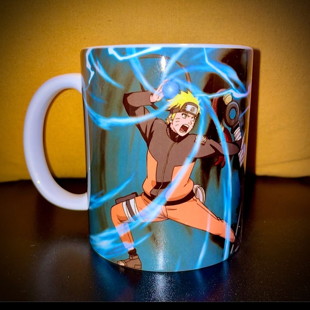 Naruto Shippuden and Sasuke fighting coffee mug